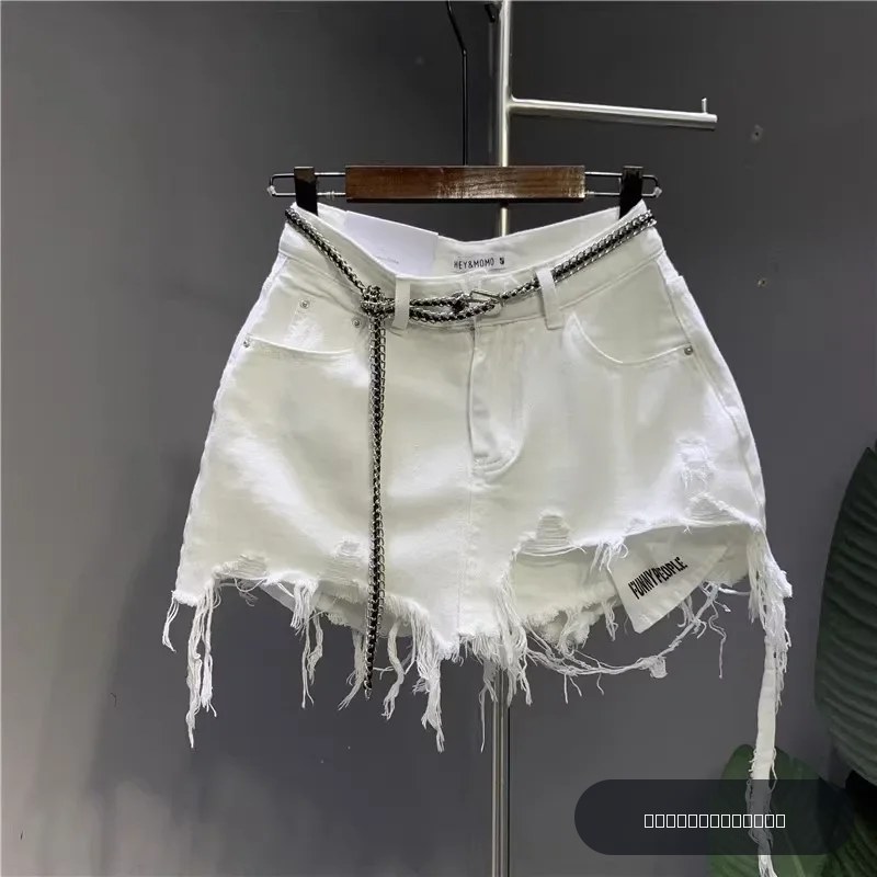 Nouveau coréen blanc brut jupe en jean irrégulière femmes Anti-marche trou nu poche exposée jupe courte
