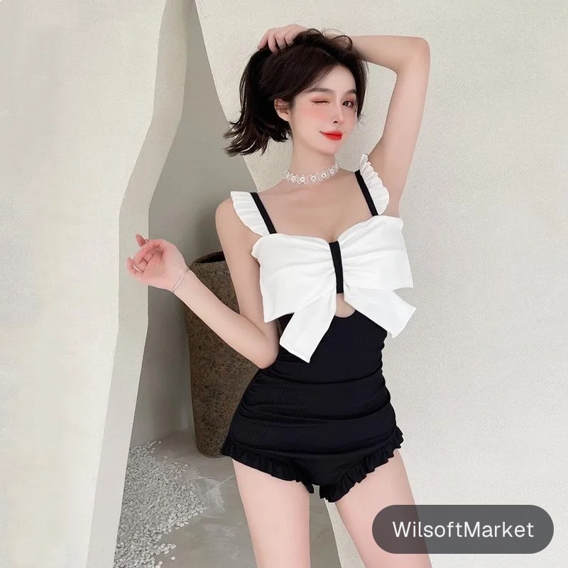Maillot de bain une pièce pour femme avec grand nœud, ceinture plissée, blocs de couleur, découpes, bord plissé et taille haute